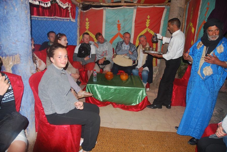 Mint tea being served to guests in the Berber tent at the ranch